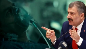 Bakan Koca, korona tedavisi gören sağlık çalışanının görüntüsünü paylaşıp vatandaşları uyardı