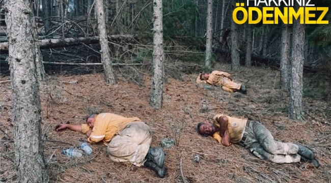 Kahraman personeller, yangını söndürdükten sonra toprakta uyudu