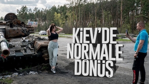 Ukraynalıların Rus enkazları ile zafer pozları 